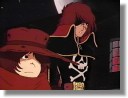 [ Harlock and Tetsuro reveal Tochiro's fate to Emeraldas... ]